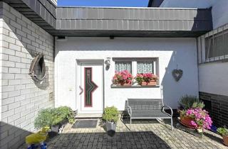 Wohnung kaufen in 64572 Büttelborn, Endlich zu Hause! EG-Eigentumswohnung mit eigenem Garten