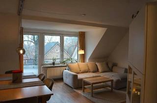 Wohnung kaufen in 25337 Kölln-Reisiek, Kölln-Reisiek - Moderne 2-Zimmer-Dachgeschosswohnung mit Balkon und TG-Stellplatz