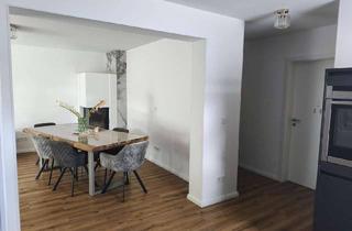 Wohnung kaufen in 40724 Hilden, Lichtdurchflutete Wohnung mit Garage, Kamin und eigenem Garten im freistehendem Haus