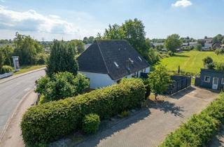 Mehrfamilienhaus kaufen in 25746 Heide, Mehrfamilienhaus mit 4 Wohneinheiten in zentrumsnaher Lage