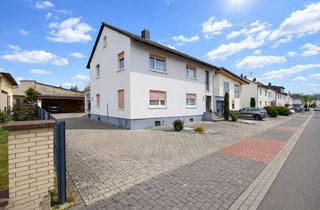 Haus kaufen in 64850 Schaafheim, Charmantes Zweifamilienhaus mit großem Garten und Entwicklungspotenzial