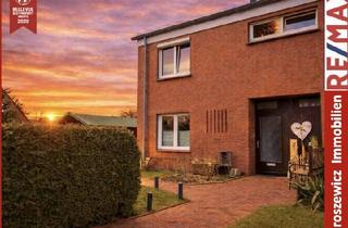 Haus kaufen in 26603 Aurich, Reihenendhaus mit großem Grundstück, Balkon & moderner Ausstattung in Aurich-Sandhorst