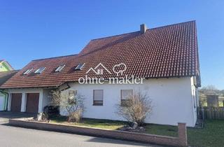 Haus kaufen in 97461 Hofheim, Zweifamilienhaus mit Sauna & Traumgarten - Viel Platz in ruhiger Ortsrandlage