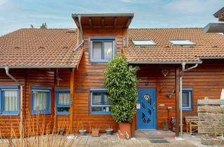 Einfamilienhaus kaufen in 64390 Erzhausen, EIN ZUHAUSE MIT SEELE - Freistehendes Einfamilienhaus in warmem Holzambiente in Erzhausen