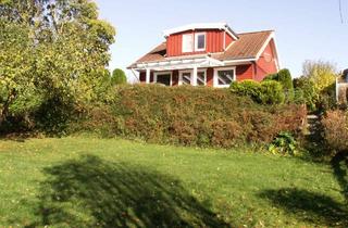 Haus kaufen in 23744 Schönwalde, charmantes Ferienhaus mit direktem Seeblick zum Kauf