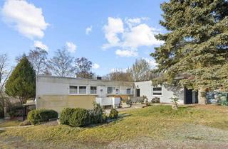Einfamilienhaus kaufen in 35321 Laubach, Großzügiger Bungalow mit Keller in ruhiger Ortsrandlage von Laubach OT