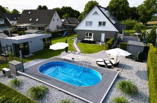 Einfamilienhaus kaufen in 23858 Reinfeld, Reinfeld (Holstein) - Modernes Einfamilienhaus nahe Hamburg: Gästehaus Pool Traumgarten