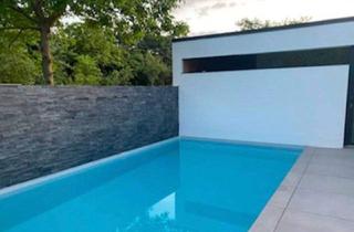 Einfamilienhaus kaufen in Albert-Schweitzer-Straße 23F, 67269 Grünstadt, Grünstadt - Einmaliges Einfamilienhaus mit Pool in Feldrandlage