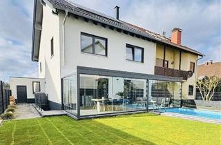 Haus kaufen in 68723 Plankstadt, 320 m² Familienresidenz mit Pool & Wintergarten | A+ | Baujahr 2021