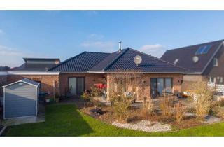 Haus kaufen in 26639 Wiesmoor, Stilvoller Bungalow auf großem Grundstück – Wohnen auf einer Ebene in Bestlage