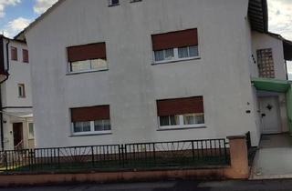 Haus kaufen in 35315 Homberg, Homberg (Ohm) - Zweifamilienhaus in ruhiger Randlage von Homberg (Ohm)