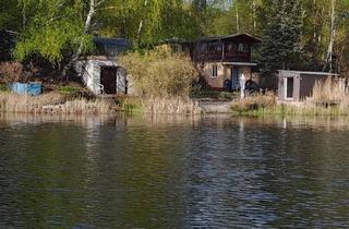 Haus kaufen in 03253 Doberlug-Kirchhain, Doberlug-Kirchhain - Wassergrundstück mit Bungalow