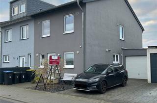 Doppelhaushälfte kaufen in 52477 Alsdorf, Doppelhaushälfte im Neubaugebiet in Alsdorf Ofden - mit Garage, Garten und effizienter Haustechnik