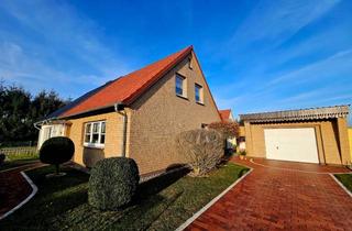 Doppelhaushälfte kaufen in 18461 Richtenberg, Wohnen mit Stil in Richtenberg: Doppelhaushälfte mit Charme und grünem Paradies