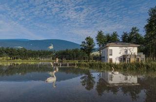 Haus kaufen in 25488 Holm, Architektur in der Schwebe: Exklusives Wohnerlebnis auf zwei Etagen.