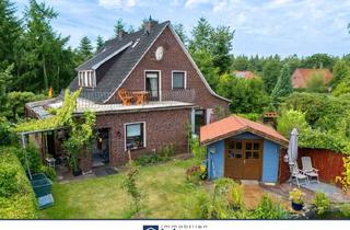 Einfamilienhaus kaufen in 26605 Aurich, Modernisiertes Einfamilienhaus zum Wohlfühlen mit neu gestalteter Gartenanlage
