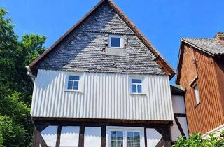 Einfamilienhaus kaufen in 35102 Lohra, Charmantes Fachwerk-Einfamilienhaus mit Innenhof, überdachter Terrasse & Garage in Lohra