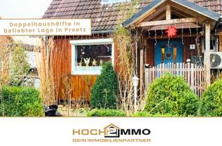 Doppelhaushälfte kaufen in 24211 Preetz, Gepflegte Doppelhaushälfte mit Charme, Garten und Kamin in beliebter Lage in Preetz!