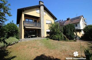 Einfamilienhaus kaufen in 63814 Mainaschaff, Mainaschaff - BERK Immobilien - Charmantes Einfamilienhaus mit Doppelgarage und großem Grundstück in Mainaschaff