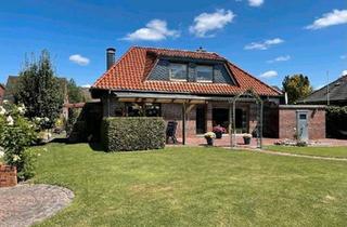 Einfamilienhaus kaufen in 26452 Sande, Sande - Modernisiertes EFH mit Gartenparadis in gefragter Lage von Sande