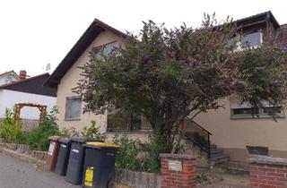Einfamilienhaus kaufen in 55270 Ober-Olm, Ober-Olm - Einfamilienhaus mit Garten und Blick auf die Frankfurter Skyline