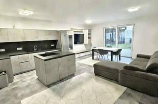 Wohnung kaufen in 63743 Obernau, Moderne Erdgeschosswohnung mit Privatgarten und Terrasse in begehrter Wohnlage von Obernau