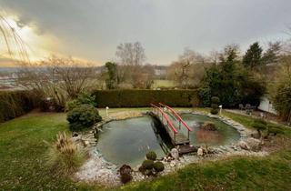 Haus kaufen in 61250 Usingen, Exklusives und stadtnahes Wohnen im Dreifamilienhaus