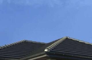 Haus kaufen in 14641 Wustermark, Im Wohn-Essbereich liegt die Essecke im Erker mit Blick nach draußen.