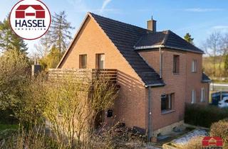 Doppelhaushälfte kaufen in 53894 Mechernich, Doppelhaushälfte mit Anbau, Wintergarten und idyllischem Garten – zum Wohlfühlen