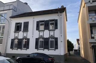 Anlageobjekt in 63165 Mühlheim, Mehrfamilienhaus mit Hinterhaus und Garagen / inkl. Baugenehmigung für 8 Wohnungen