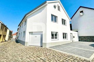 Einfamilienhaus kaufen in 37351 Dingelstädt, Teilsaniertes EFH in zentraler Lage mit 2 Garagen