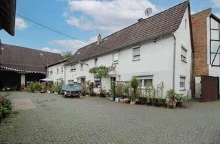 Mehrfamilienhaus kaufen in 65835 Liederbach, Vielseitiges Mehrfamilienhaus mit Scheune & 6 Garagen in ruhiger Sackgasse von Liederbach