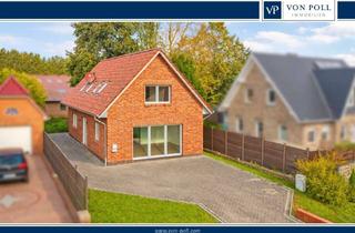 Haus kaufen in 26529 Leezdorf, Neuwertiges Zweifamilienhaus in ruhiger Lage von Leezdorf