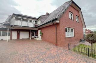 Haus kaufen in 49828 Neuenhaus, Großzügiges Zweifamilienhaus mit Einliegerwohnung, Garten & Garagen – flexibel nutzbar