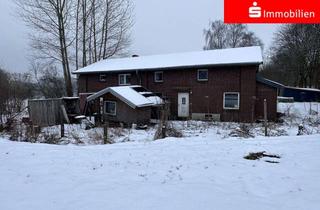 Haus kaufen in 25782 Gaushorn, Zweifamilienhaus mit Ausbaureserve auf großem Grundstück