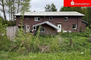 Haus kaufen in 25782 Gaushorn, Zweifamilienhaus mit Ausbaureserve auf großem Grundstück