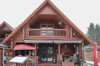 Anlageobjekt in 38524 Sassenburg, Kleines Holzhaus mit Garage, Carport, Kamin, Terrasse und Garten in Neudorf-Platendorf bei Gifhorn