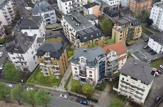 Wohnung kaufen in 61231 Bad Nauheim, Attraktive 2-Zimmer-Neubauwohnung mit privatem Gartenanteil in gefragter Lage von Bad Nauheim