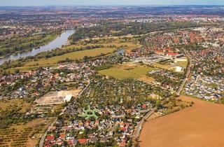 Garagen kaufen in 39114 Magdeburg, Top Baugrundstück mit Altbestand: Wochenendbungalow, Garage und kleiner Werkstatt