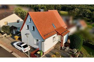 Einfamilienhaus kaufen in 34298 Helsa, Helsa - Einfamilienhaus mit Einliegerwohnung mit spektakulärem Ausblick!