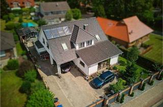 Einfamilienhaus kaufen in 26215 Wiefelstede, Wiefelstede / Ofenerfeld - Großzügiges Haus mit Remise und Outdoorküche