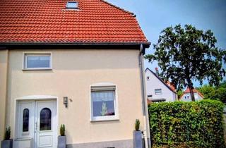 Doppelhaushälfte kaufen in 45701 Herten, Herten - Charmante Doppelhaushälfte mit großem Garten und Carport