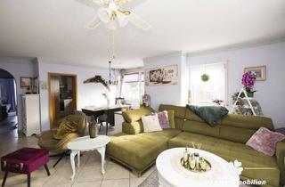 Wohnung kaufen in 63741 Damm, BERK Immobilien - gemütliche 3-Zimmer-Erdgeschosswohnung mit großer Terrasse, Balkon & Gartenzugang