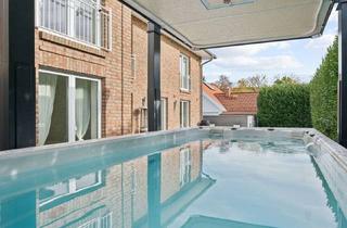Einfamilienhaus kaufen in 73087 Bad Boll, Energieeffizientes Einfamilienhaus mit Wärmepumpe, ELW, Doppelgarage u. beheizbarem Pool in Bad Boll