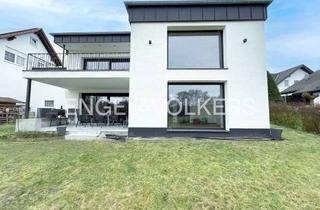 Einfamilienhaus kaufen in 58730 Fröndenberg, Wohnen am Feldrand - saniertes Einfamilienhaus mit Bungalowcharakter und freiem Blick ins Grüne!