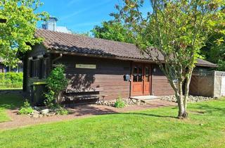 Haus kaufen in 24351 Damp, Blockhaus in TOP-Lage mit großem Grundstück und Wintergarten