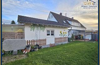 Doppelhaushälfte kaufen in 56424 Bannberscheid, Von RTI: Modernisierte Doppelhaushälfte mit Anbau und Garten in Bannberscheid!