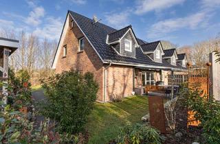 Haus kaufen in 24805 Hamdorf, Neuwertige DHH in Hamdorf – Energieeffizient, großzügig und überaus gepflegt