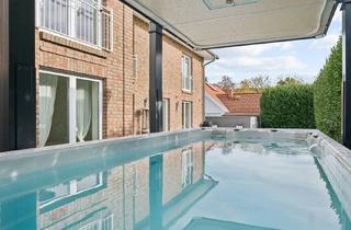 Einfamilienhaus kaufen in 73087 Bad Boll, Energieeffizientes Einfamilienhaus mit Wärmepumpe, ELW, Doppelgarage u. beheizbarem Pool in Bad Boll