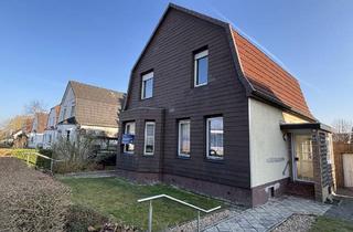 Einfamilienhaus kaufen in 26452 Sande, Zweifamilienhaus mit Doppelgarage in Sande!